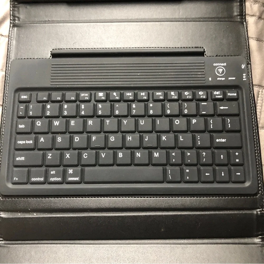 BROOKSTONE IPad cover, keyboard and stand. Black Leather
